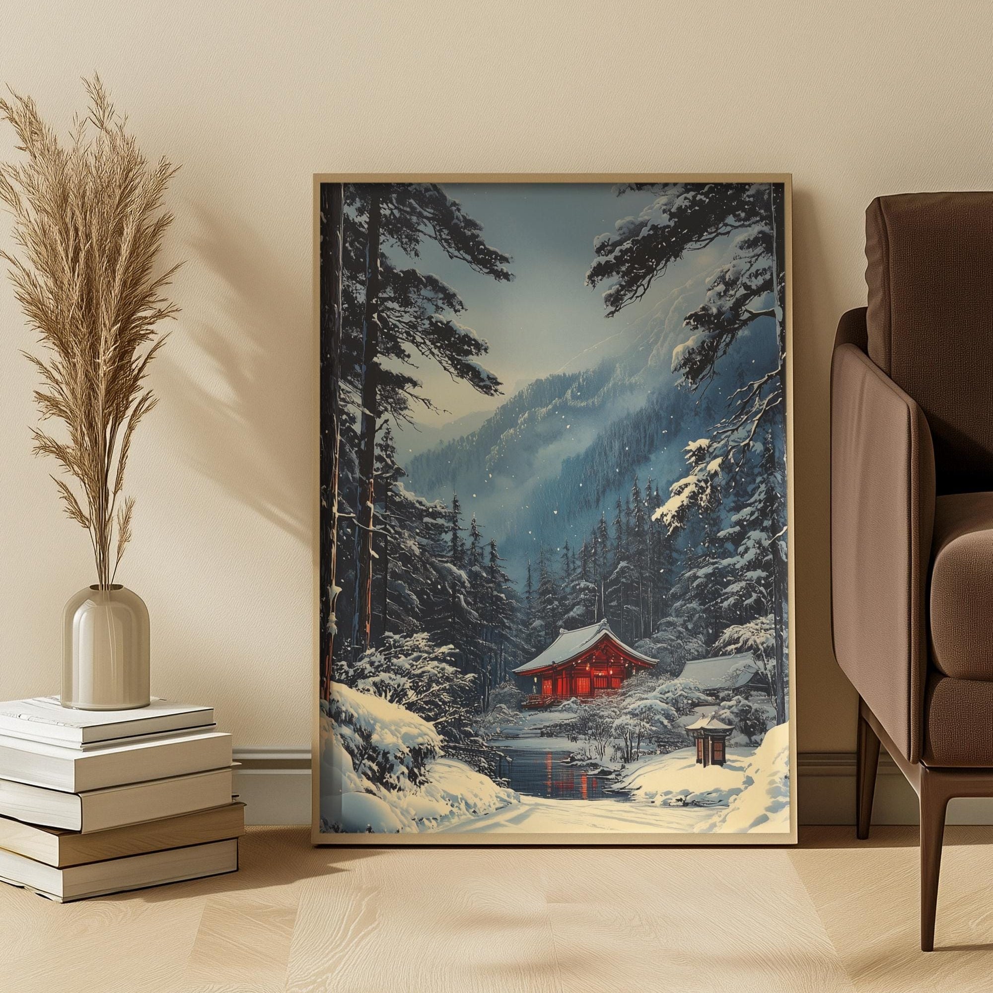Framed Japanese winter shinto landscape print on a wall with a cozy room setting.