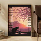 Framed artwork of a cat drinking from a teacup with cherry blossoms and Mount Fuji in the background, placed on a shelf.