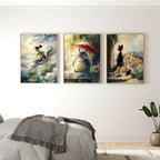 A three-piece framed canvas wall art set depicting Totoro from My Neighbor Totoro in a bedroom setting. The paintings are displayed on a white wall above a bed with gray bedding, with a wooden dresser and a potted plant in the background.