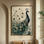 A framed wall art print featuring a stylized peacock with a long feathered tail in deep blue, teal, cream, and gold tones, displayed in a warm beige interior above a wooden bench.