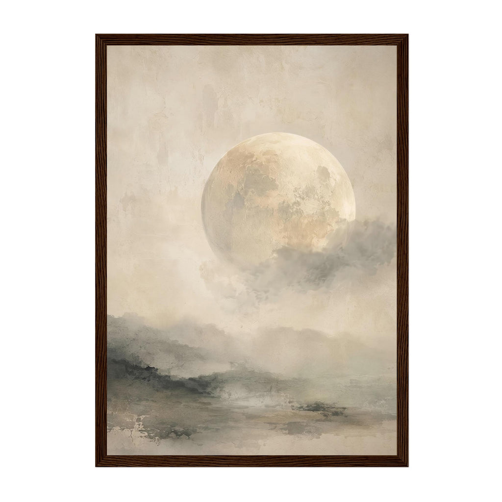 Framed wall art featuring a large pale moon glowing above misty, soft-focus hills in muted beige, gray, and brown tones, enclosed in a dark brown rectangular frame.
