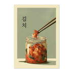 A stylized art print featuring Korean kimchi in a glass jar with chopsticks lifting a piece, set on a cream background with a muted sage panel and black Korean text.