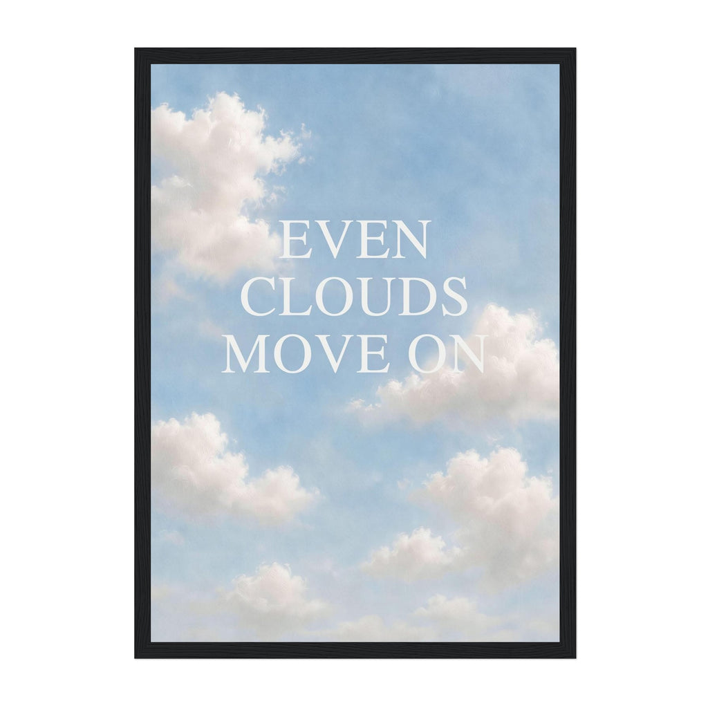 A framed art print featuring the text 'EVEN CLOUDS MOVE ON' in white serif letters over a soft blue sky with white clouds, set against a clean white background.