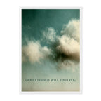 A vertical art print featuring a textured teal and cream sky with soft clouds and the text 'GOOD THINGS WILL FIND YOU' at the bottom, shown with a white border on a white background.