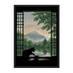 Silhouette of a cat by a window with a mountain view