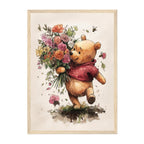 Framed artwork of Winnie the Pooh holding flowers on a white background