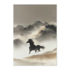 Silhouette of a horse running in front of a mountainous landscape with mist.