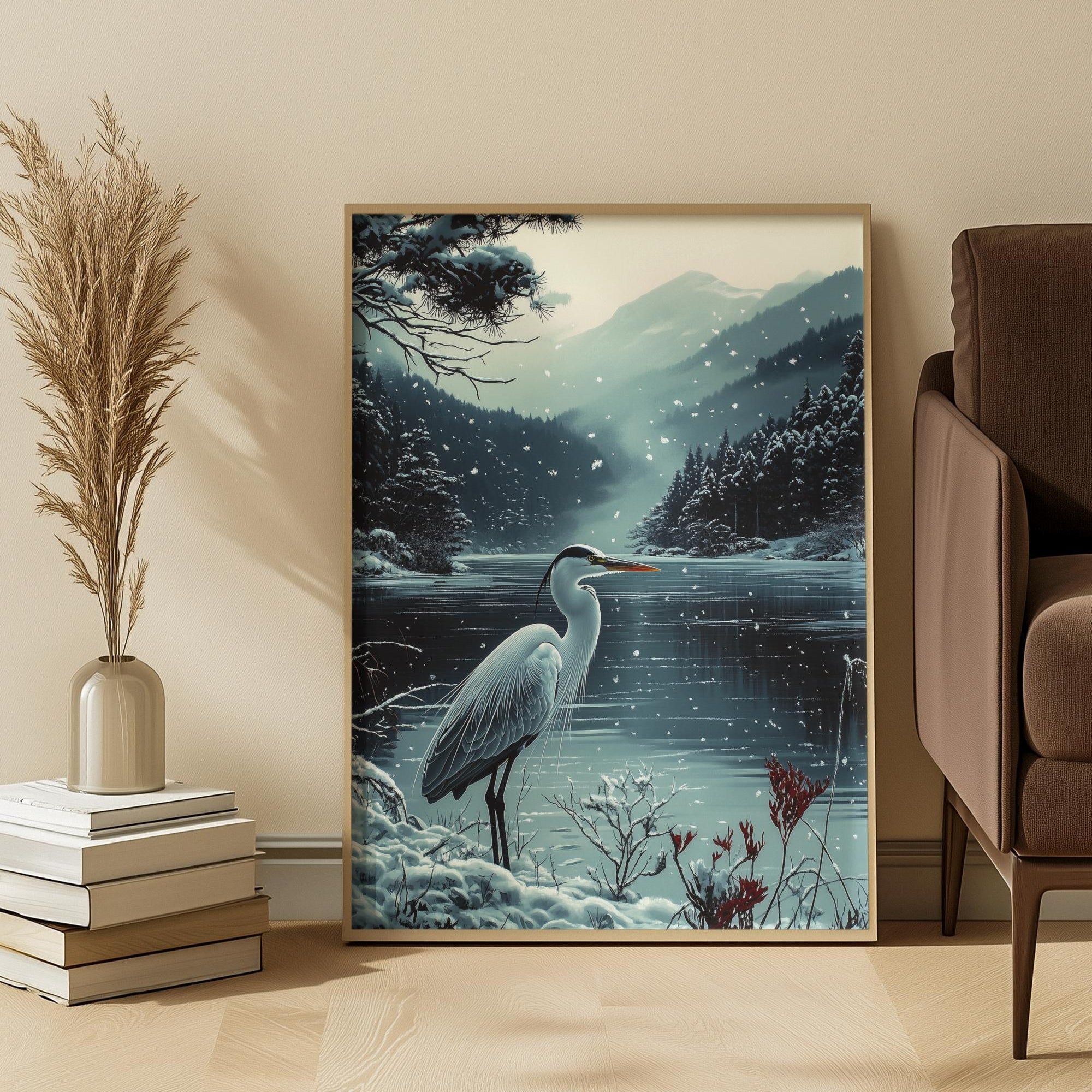 Framed artwork of a heron by a lake with mountains in a living room setting.