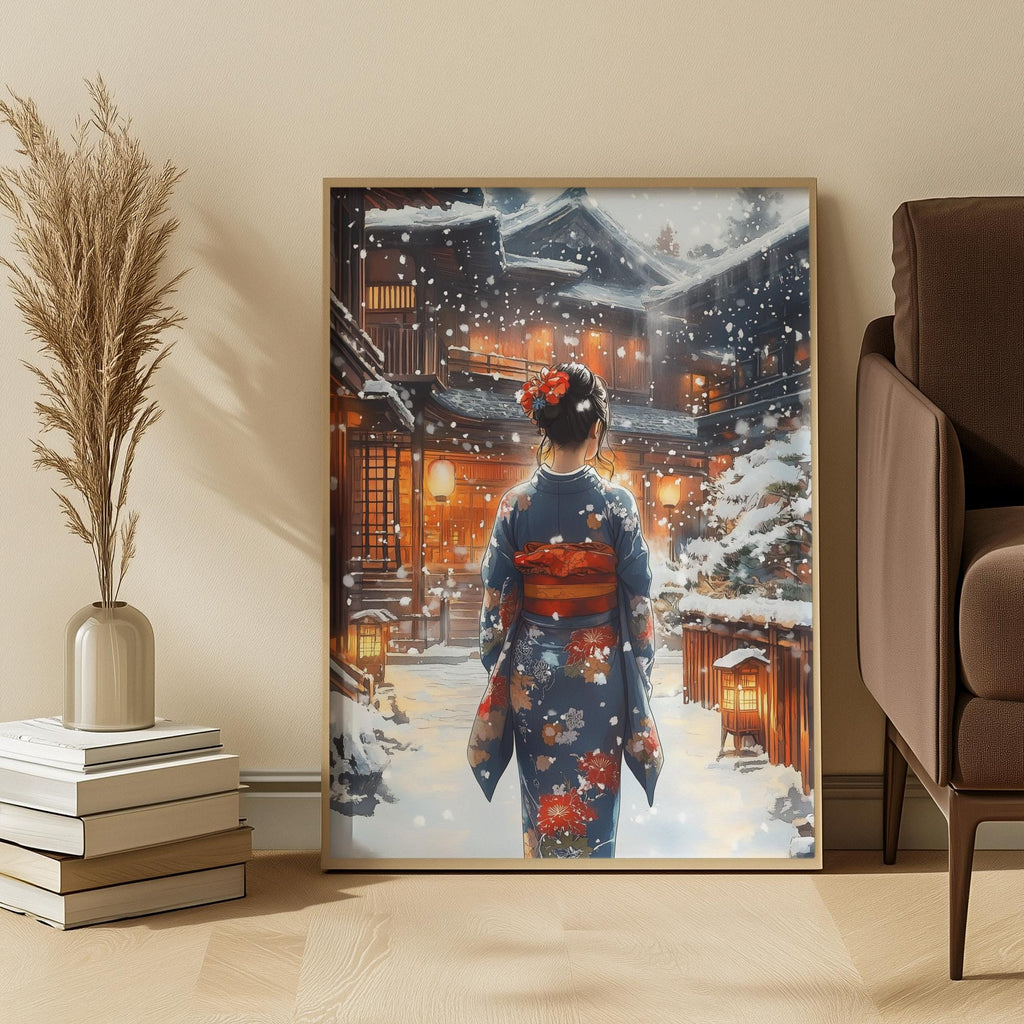 Framed artwork of a woman in a traditional kimono standing in a snowy Japanese village scene, placed on a wall in a room with a chair and decorative items.